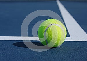 Tennis Ball at Baseline photo