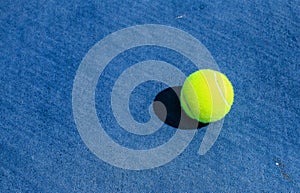 Tennis Ball on Blue Hard Court