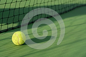 Tennis ball on blur net