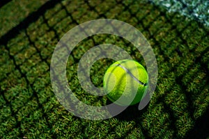 Tennis ball on grass tennis court
