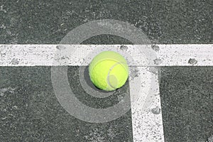 Tennis ball on Har-Tru clay tennis court