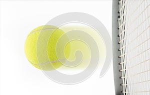 Tennis ball hit by raquet on white background