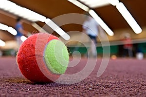 Tennis ball on indoor court
