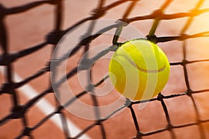 Tennis ball in net