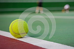 Tennis ball on net background