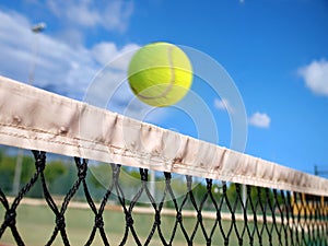 Tennis ball over the net