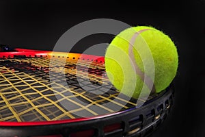 Tennis ball and racket