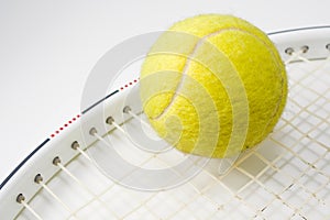 Tennis ball and racquet