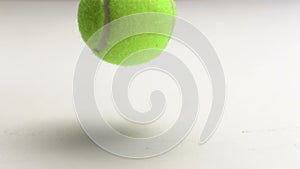 Tennis ball rebounding