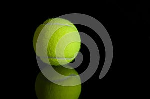 Tennis ball with reflection