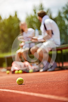 Tennis ball on tennis court