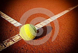 Tennis ball on a tennis court photo