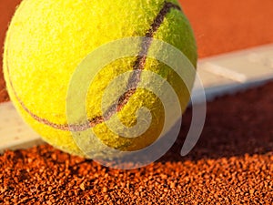 Tennis ball on a tennis court photo