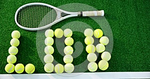 Tennis balls forming word lob in court 4k
