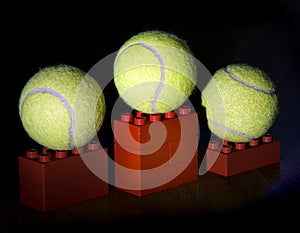 Tennis balls on podium