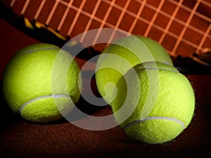 Tennis balls and racket