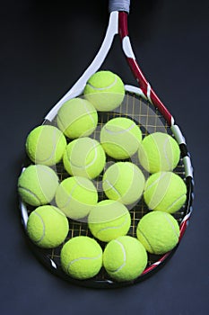 Tennis Balls on Racquet Strings