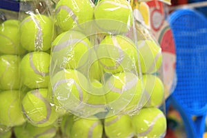 Tennis balls on sale in the store, close-up