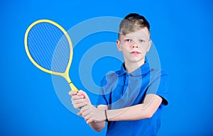 Tennis club. Tennis player with racket. Childhood activity. Little boy. Fitness diet brings health and energy. Gym