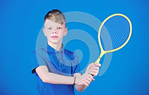 Tennis club. Tennis player with racket. Childhood activity. Little boy. Fitness diet brings health and energy. Gym