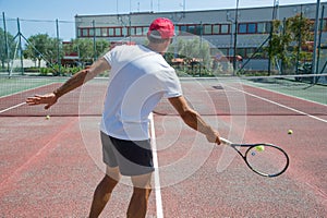 Tennis coach outdoors