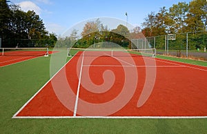 Tennis court under blue sky