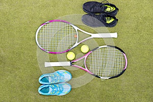 Tennis equipment set of two tennis rackets, two balls, male and