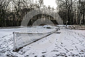 Tennis ground with net down in one of the outdoor public parks in Stavanger city