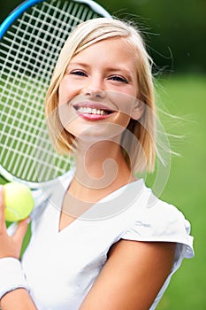 Tennis, happy woman and portrait with racket, ball and training to play match, contest or competition outdoor. Face