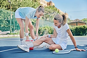 Tennis, medic with first aid and woman with knee pain, torn muscle or inflammation on court while training. Female coach