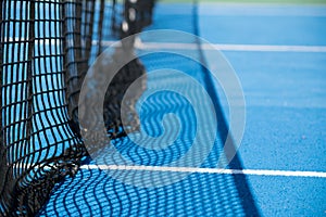 tennis net with blue court