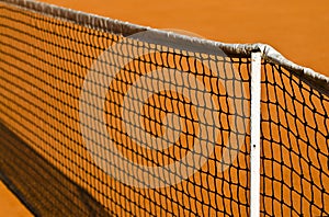 Tennis net and clay