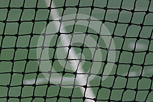 Tennis net on court background