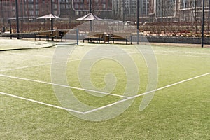 Tennis net on a green field