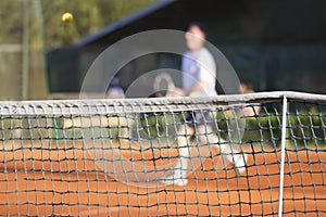 Tennis net Man plays tennis