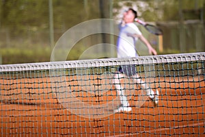 Tennis net Man plays tennis
