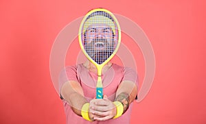 Tennis player beginner retro fashion. Tennis sport and entertainment. Concentrated on tennis court. Athlete hipster hold