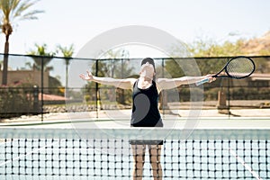 Tennis player celebrating her win