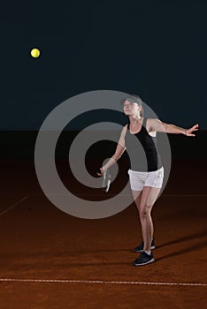 Tennis Player Hitting Tennis Ball