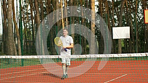 Tennis player scoring match point and winning game
