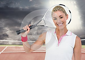 Tennis player smiling on tennis court with bright light and dark clouds