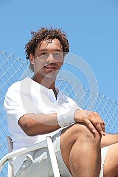 Tennis player in umpire's chair