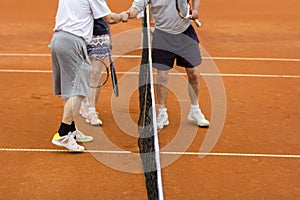 Tennis players shake hands