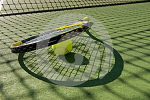 Tennis Racket and Ball on Court