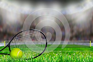 Tennis Racket and Ball on Grass Court With Copy Space