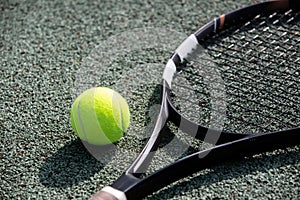 Tennis racket and ball on the professional tennis court, sport concept