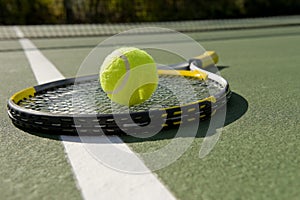 Tennis Racket and ball on white
