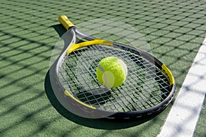 Tennis Racket and ball on white photo