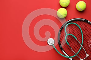 Tennis racket, balls and stethoscope on red background, flat lay with space for text. Doping concept