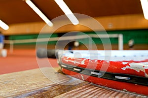 Tennis racket on bench